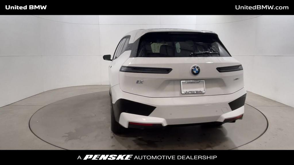 new 2024 BMW iX car, priced at $99,345