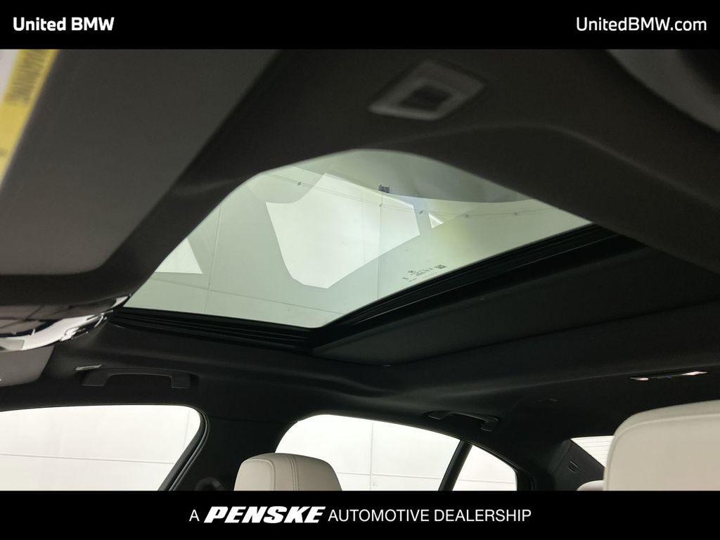 used 2024 BMW i5 car, priced at $46,960