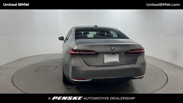 used 2024 BMW i5 car, priced at $59,995