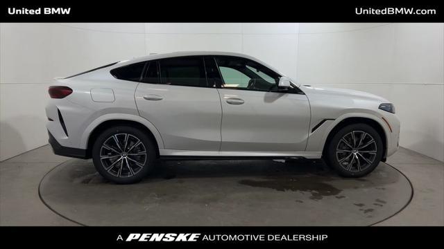 new 2025 BMW X6 car, priced at $77,875