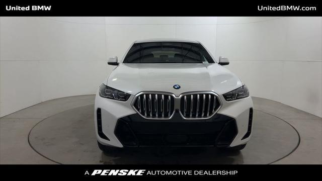 new 2025 BMW X6 car, priced at $77,875