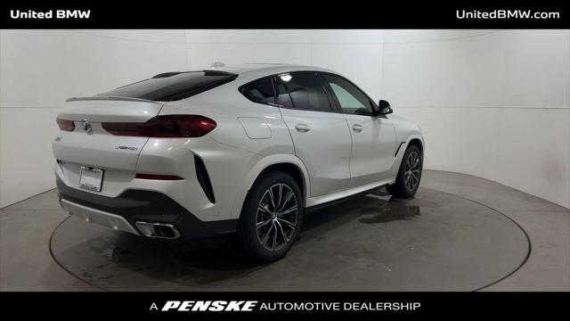 new 2025 BMW X6 car, priced at $77,875