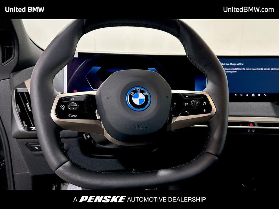 new 2024 BMW iX car, priced at $100,550