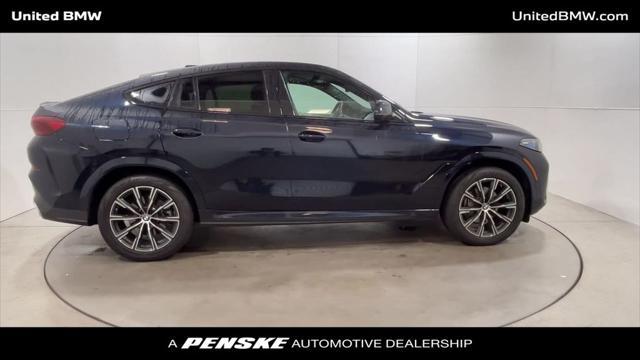 used 2024 BMW X6 car, priced at $75,495