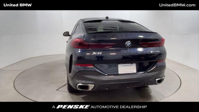 used 2024 BMW X6 car, priced at $75,495