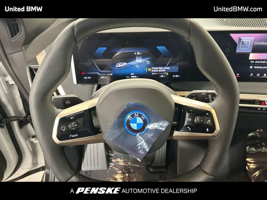 new 2025 BMW iX car, priced at $97,515
