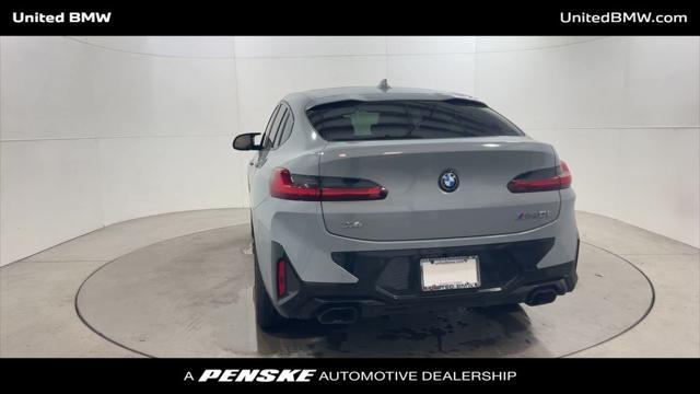 used 2024 BMW X4 car, priced at $63,460