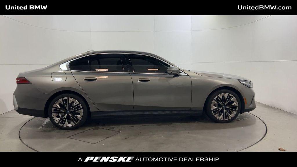 used 2024 BMW i5 car, priced at $48,995