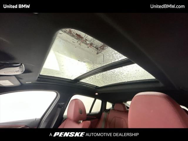 used 2025 BMW X4 car, priced at $55,495