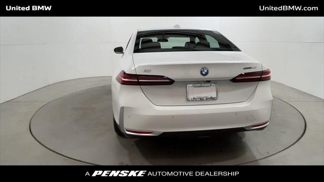 used 2024 BMW i5 car, priced at $59,996