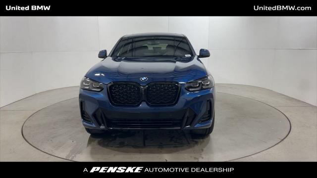 used 2025 BMW X4 car, priced at $60,996