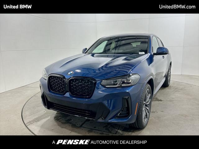 used 2025 BMW X4 car, priced at $60,996