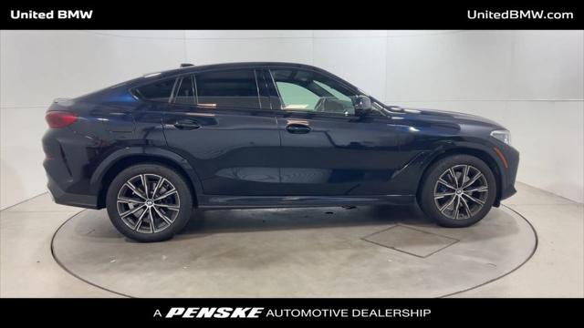 used 2022 BMW X6 car, priced at $53,460