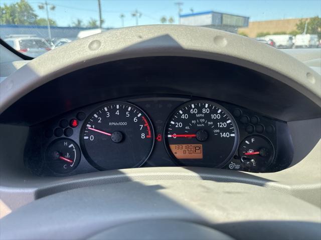 used 2013 Nissan Frontier car, priced at $10,000