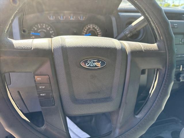 used 2014 Ford F-150 car, priced at $14,000