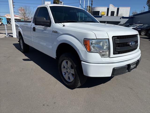 used 2014 Ford F-150 car, priced at $14,000