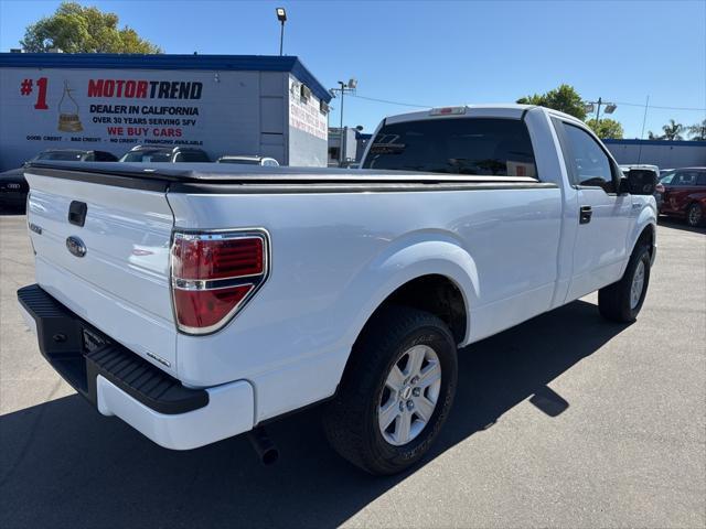 used 2014 Ford F-150 car, priced at $14,000