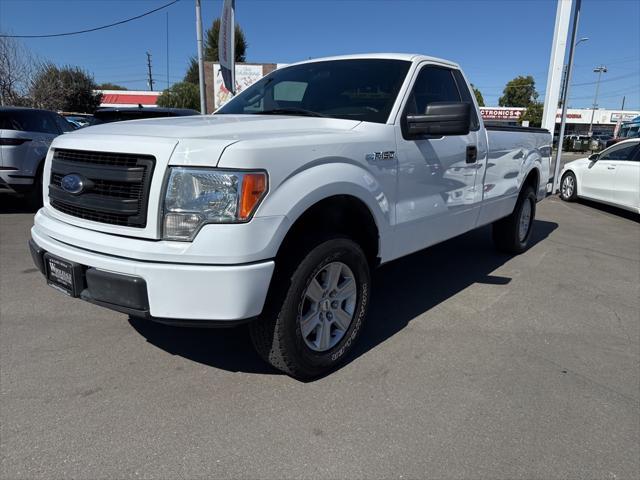 used 2014 Ford F-150 car, priced at $14,000