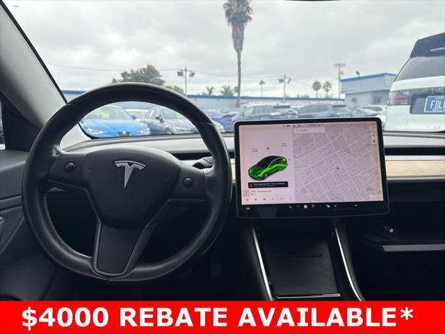 used 2018 Tesla Model 3 car, priced at $20,000