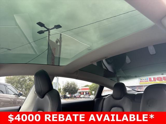 used 2018 Tesla Model 3 car, priced at $20,000