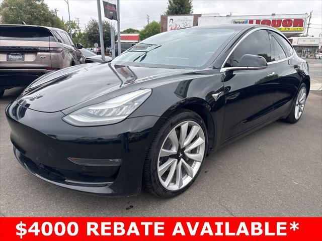 used 2018 Tesla Model 3 car, priced at $20,000
