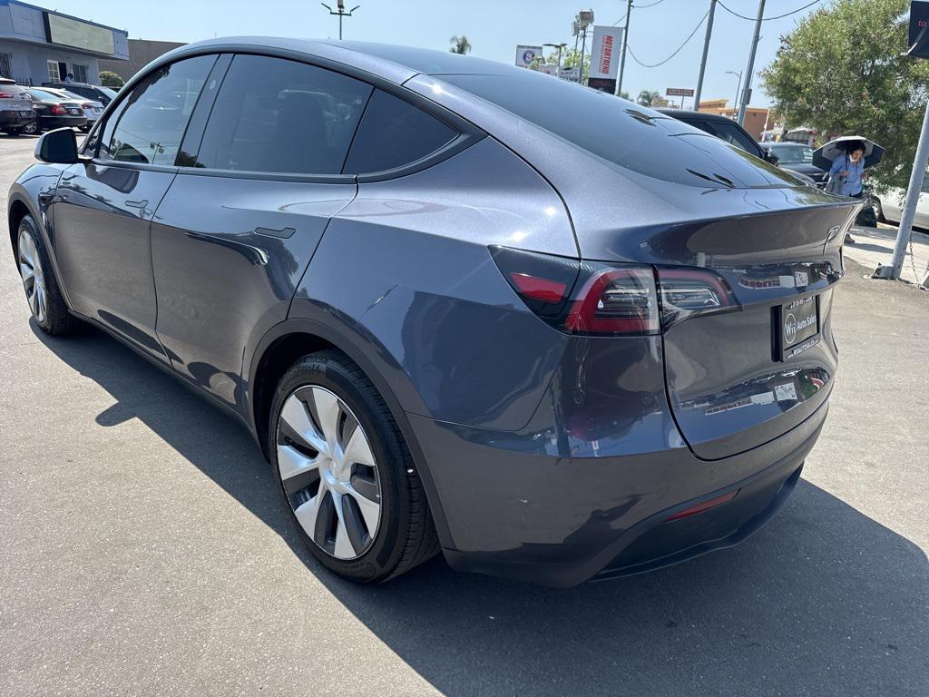 used 2023 Tesla Model Y car, priced at $28,000