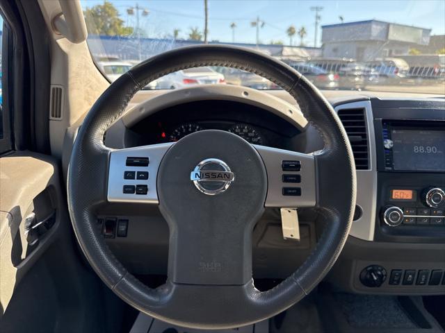 used 2016 Nissan Frontier car, priced at $18,000