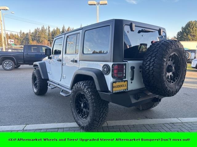 used 2014 Jeep Wrangler Unlimited car, priced at $21,699