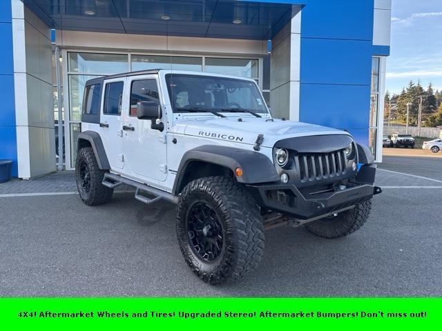 used 2014 Jeep Wrangler Unlimited car, priced at $21,699