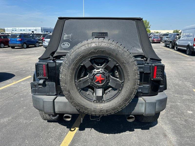 used 2014 Jeep Wrangler Unlimited car, priced at $13,495