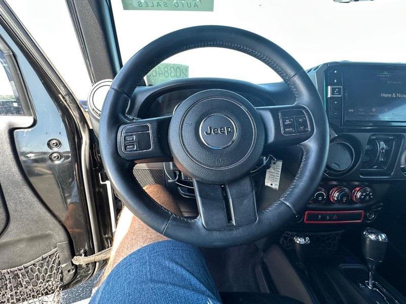 used 2014 Jeep Wrangler Unlimited car, priced at $13,495