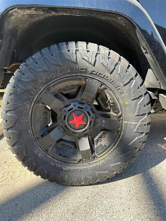 used 2014 Jeep Wrangler Unlimited car, priced at $13,295