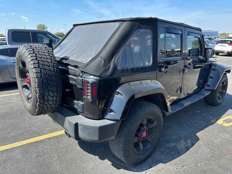 used 2014 Jeep Wrangler Unlimited car, priced at $13,495