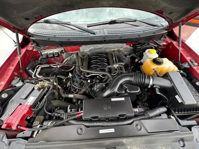 used 2014 Ford F-150 car, priced at $10,000