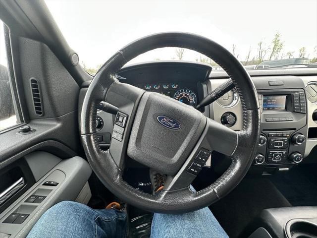 used 2014 Ford F-150 car, priced at $10,000