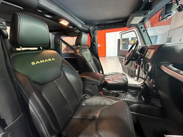 used 2015 Jeep Wrangler car, priced at $23,995