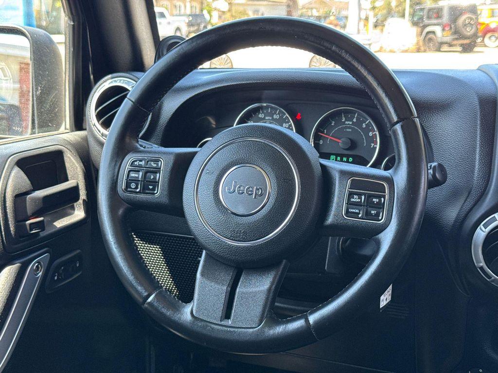 used 2011 Jeep Wrangler Unlimited car, priced at $13,995