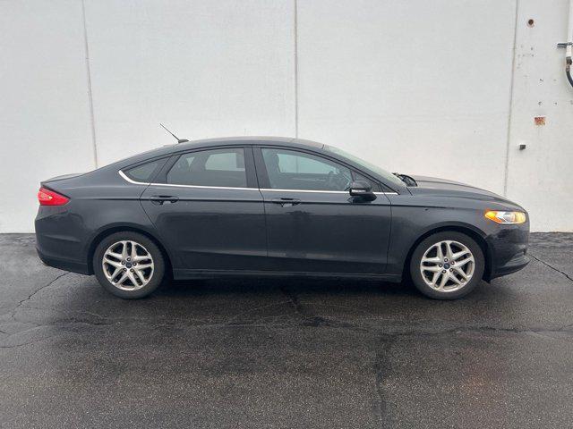 used 2015 Ford Fusion car, priced at $9,000