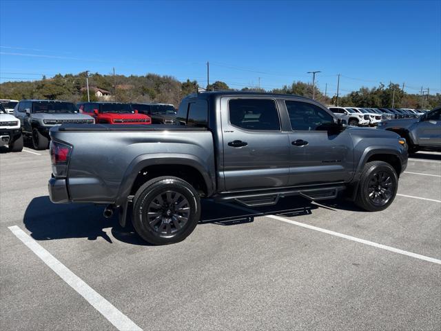 used 2023 Toyota Tacoma car, priced at $40,243