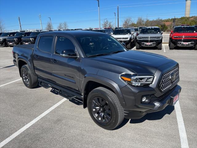 used 2023 Toyota Tacoma car, priced at $40,243