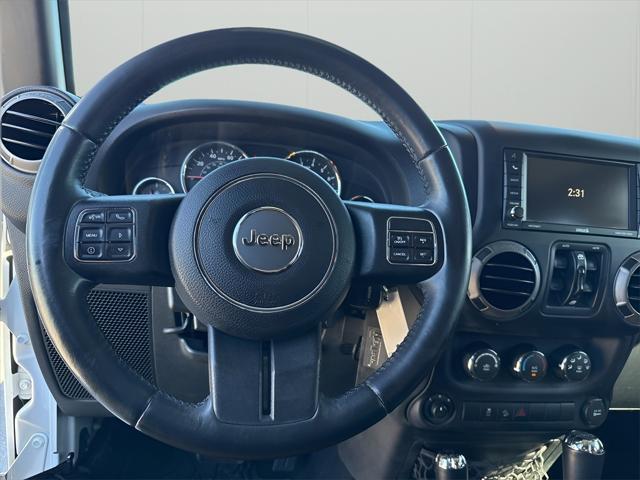 used 2015 Jeep Wrangler Unlimited car, priced at $18,897