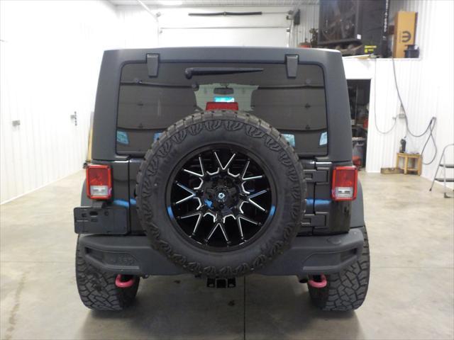 used 2015 Jeep Wrangler Unlimited car, priced at $24,999