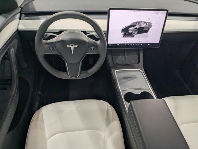 used 2024 Tesla Model Y car, priced at $36,990