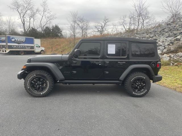 used 2022 Jeep Wrangler Unlimited car, priced at $32,687