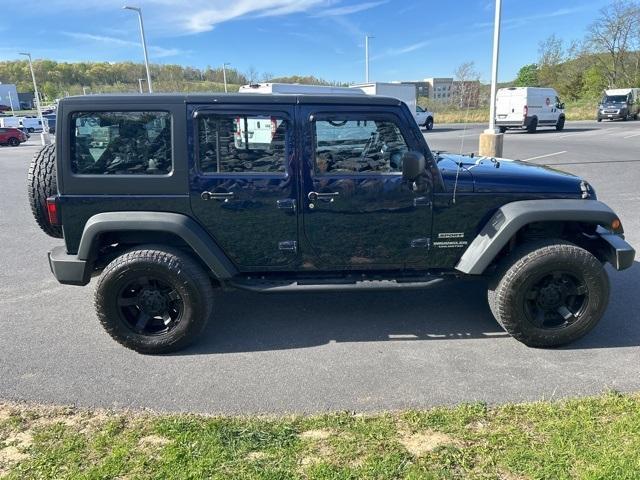 used 2013 Jeep Wrangler Unlimited car, priced at $19,444