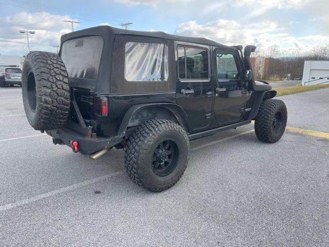 used 2015 Jeep Wrangler Unlimited car, priced at $21,498