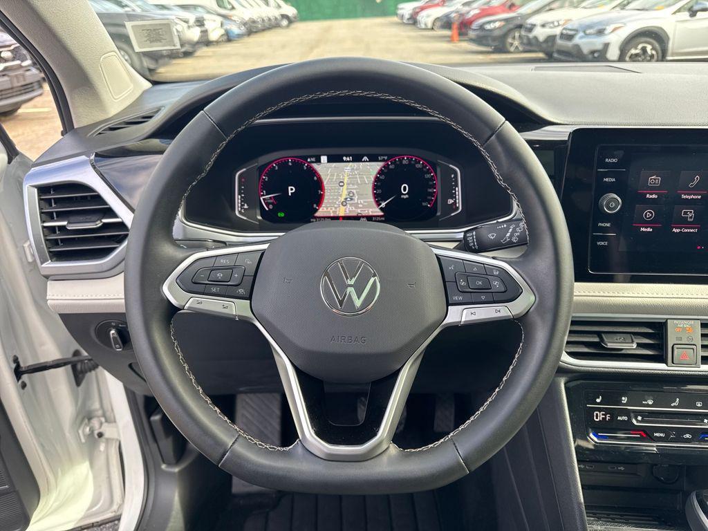 used 2025 Volkswagen Taos car, priced at $30,499