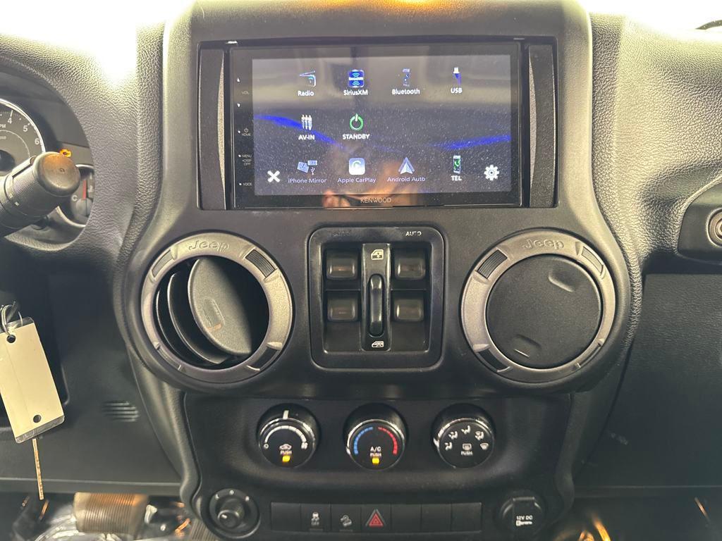 used 2015 Jeep Wrangler Unlimited car, priced at $16,399