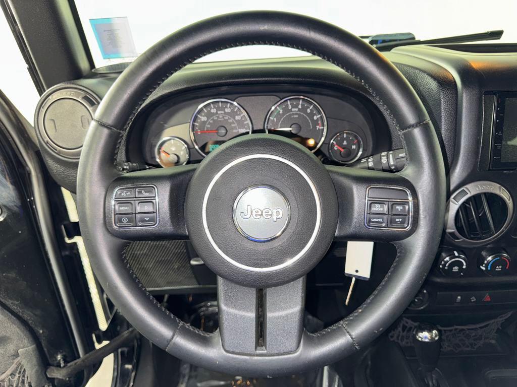 used 2015 Jeep Wrangler Unlimited car, priced at $16,399