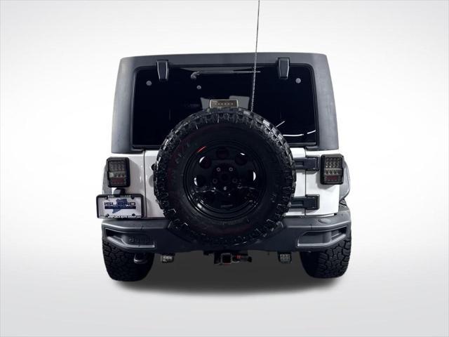 used 2015 Jeep Wrangler Unlimited car, priced at $18,729